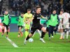 Karlsruhe's Marvin Wanitzek celebrates scoring his team's second goal to make during a German Cup soccer match between Karlsruher SC and FC Augsburg, Wednesday, Dec. 4, 2024, in Karlsruhe, Germany. (Uli Deck/dpa via AP)