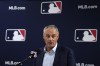 Major League Baseball commissioner Rob Manfred speaks during a baseball spring training media day, in Tampa, Fla., Thursday, Feb. 15, 2024. THE CANADIAN PRESS/AP-Charlie Neibergall