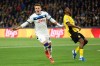 Atalanta's Mateo Retegui, left, celebrates after scoring the opening goal during the UEFA Champions League opening phase soccer match between BSC Young Boys and Atalanta BC in Bern, Switzerland, Tuesday, Nov. 26, 2024. (Peter Klaunzer/Keystone via AP)