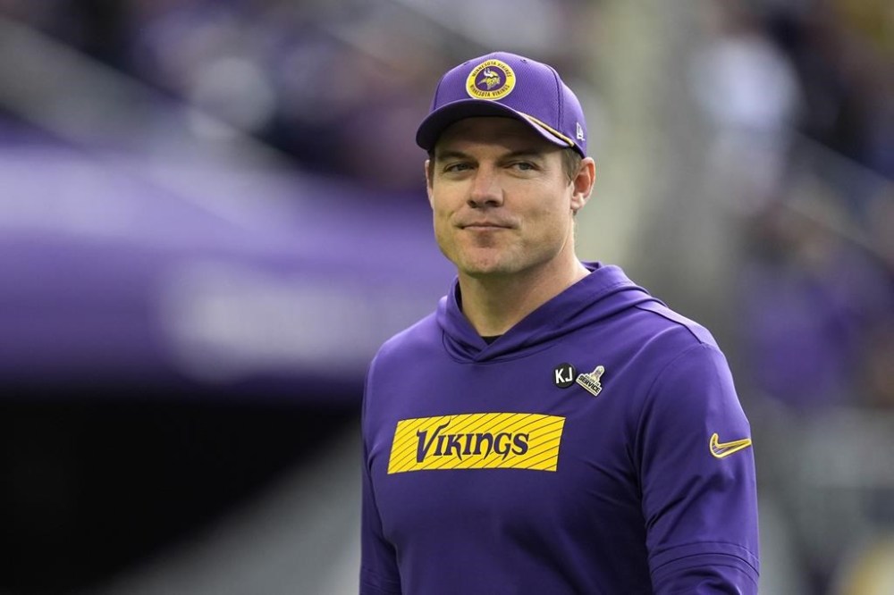 Minnesota Vikings head coach Kevin O'Connell walks on the field before an NFL football game against the Arizona Cardinals Sunday, Dec. 1, 2024, in Minneapolis. (AP Photo/Abbie Parr)