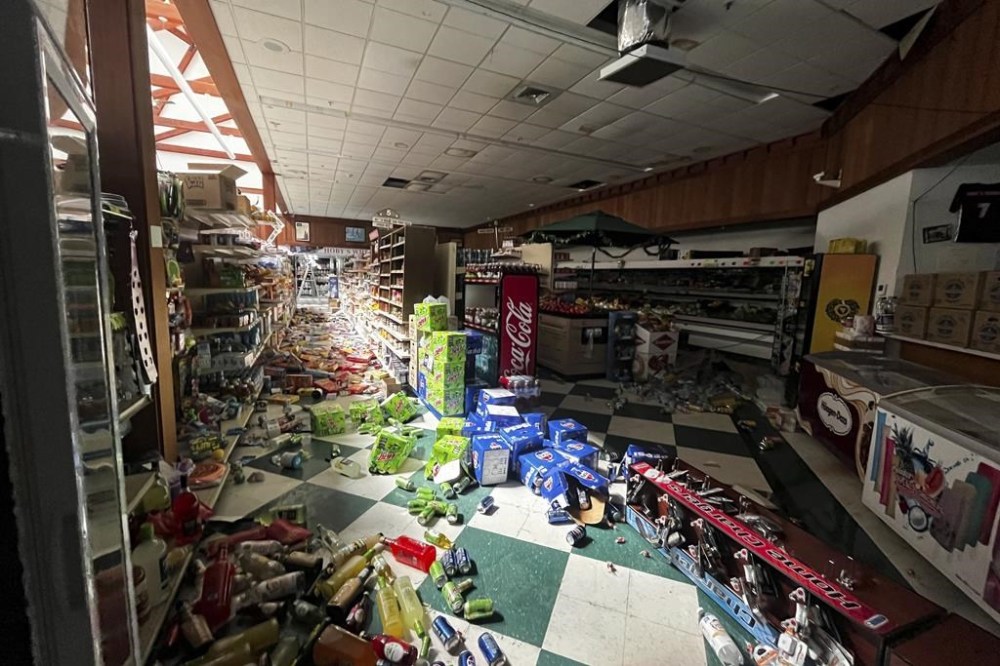 Drinks and other food items are toppled on the floor inside Hoby's Market and Deli after an earthquake Thursday, Dec. 5, 2024, in Scotia, Calif. (Dylan McNeill/The Times-Standard via AP)