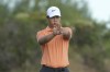 Tom Kim, of South Korea, lines up his putt on the 18th green during the first round of the Hero World Challenge PGA Tour at the Albany Golf Club, in New Providence, Bahamas, Thursday, Dec. 5, 2024. (AP Photo/Fernando Llano)