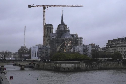 Notre-Dame de Paris cathedral is pictured ahead of Saturday's reopening ceremony, Thursday, Dec. 5, 2024 in Paris, after more than five years of reconstruction following the fire that devastated Notre Dame in 2019. THE CANADIAN PRESS/AP - Christophe Ena