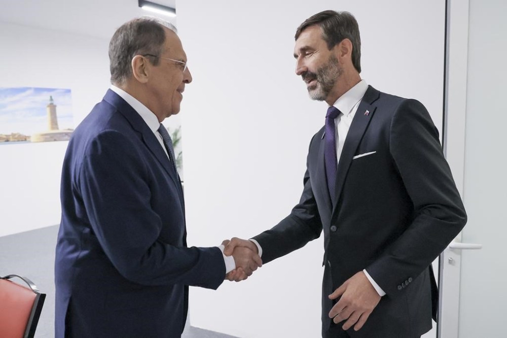 In this photo released by Russian Foreign Ministry Press Service, Russia's Foreign Minister Sergey Lavrov, left, Slovakian Foreign Minister Juraj Blanar greet each other during their meeting on the sidelines of a plenary session of the 31st Organization for Security and Cooperation in Europe (OSCE) Ministerial summit, in Ta'Qali, Malta, Thursday, Dec. 5, 2024. (Russian Foreign Ministry Press Service via AP)
