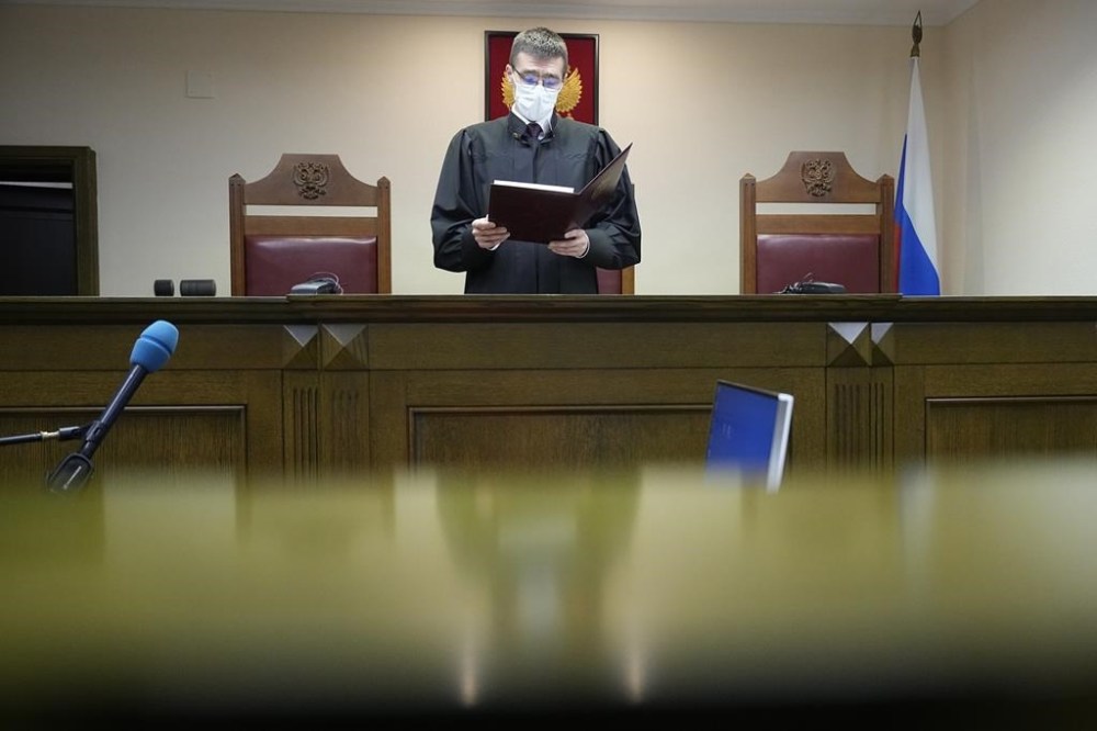 FILE - Russian Supreme Court judge Oleg Nefedov leads a hearing in Moscow on Nov. 30, 2023. The Supreme Court banned the LGBTQ+