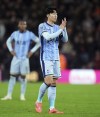 Tottenham Hotspur's Son Heung-Min applauds supporters following a Premier League soccer match against Bournemouth at the Vitality Stadium, Thursday, Dec. 5, 2024, in Bournemouth, England. (Adam Davy/PA via AP)