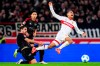 Stuttgart's Enzo Millot, right, is tripped up by Union Berlin's Rani Khedira during a Bundesliga soccer match between VfB Stuttgart and 1. FC Union Berlin, Friday, Dec. 6, 2024, in Stuttgart, Germany. (Tom Weller/dpa via AP)