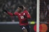 Lille's Jonathan David celebrates after scoring the opening goal during the Champions League opening phase soccer match between Lille and Juventus at the Stade Pierre Mauroy in Villeneuve-d'Ascq, outside Lille, France, Tuesday, Nov. 5, 2024. THE CANADIAN PRESS/AP Photo/Christophe Ena