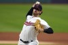 FILE - Cleveland Guardians' Shane Bieber pitches to a Baltimore Orioles batter during the first inning of a baseball game Friday, Sept. 22, 2023, in Cleveland. (AP Photo/Sue Ogrocki, File)