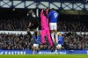 Everton's Iliman Ndiaye, not pictured, scores their side's third goal of the game before being ruled for a foul on Wolverhampton Wanderers goalkeeper Jose Sa, centre, by Dominic Calvert-Lewin, right, during the Premier League match at Goodison Park, Liverpool, Wednesday Dec. 4, 2024. (Peter Byrne/PA via AP)