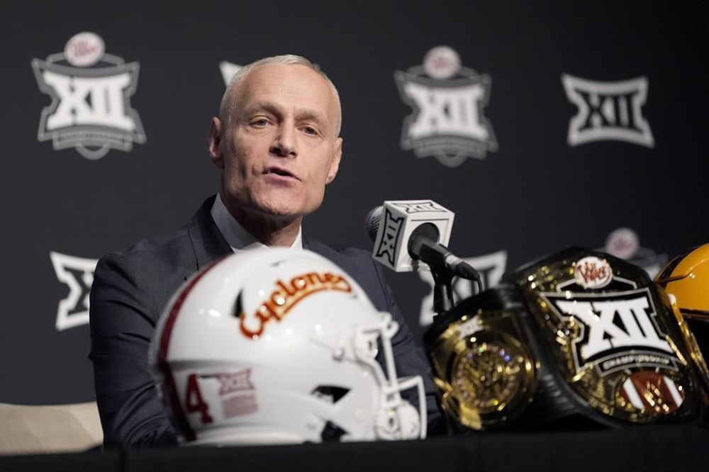 Big 12 Commissioner Brett Yormark responds to questions during a news conference before the Big 12 Conference championship NCAA college football game between Iowa State and Arizona State, in Arlington, Texas, Saturday Dec. 7, 2024. (AP Photo/LM Otero)