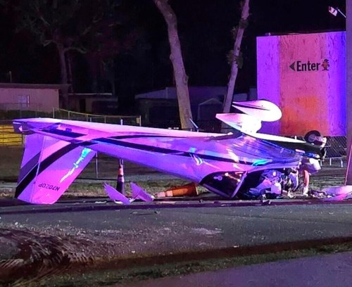 In this photo provided by the Florida Department of Highway Safety and Motor Vehicles, a single engine fixed-wing airplane lies upside down after it crashed on West White Dogwood Drive near the intersection of US-98 in Homosassa, Fla. on Friday evening, Dec. 6, 2024. (Florida Department of Highway Safety and Motor Vehicles via AP)
