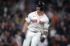 FILE - Boston Red Sox's Tyler O'Neill celebrates after his game-winning three-run home run in the bottom of the 10th inning of a baseball game against the Baltimore Orioles at Fenway Park, Wednesday, Sept. 11, 2024, in Boston. (AP Photo/Charles Krupa, File)