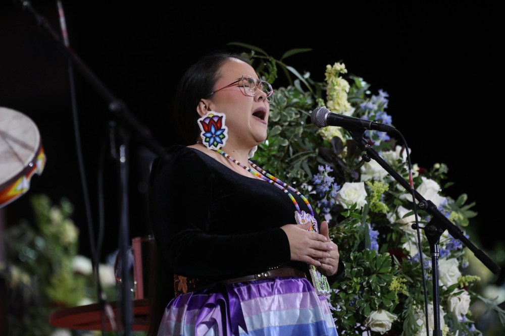 Cree/Salish singer Fawn Wood performs during the service. (Ruth Bonneville / Free Press)