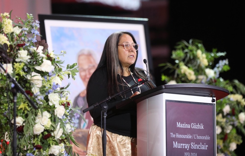 Stephanie Scott, Executive Director of the National Centre for Truth and Reconciliation, gives her remarks Sunday. (Ruth Bonneville / Free Press)