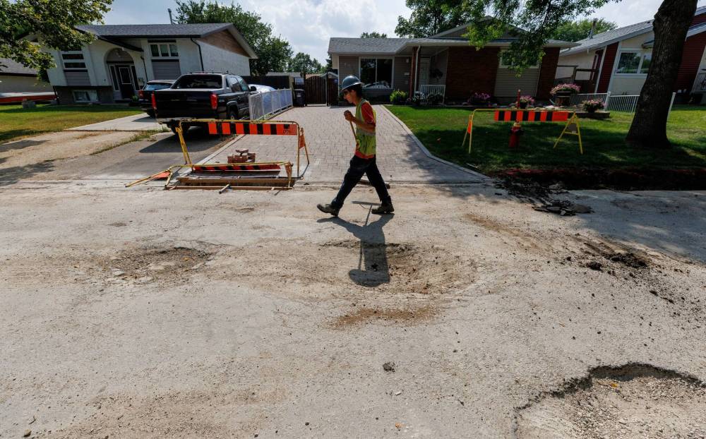 MIKE DEAL / FREE PRESS
                                Once the project got underway, it proceeded relatively quickly, residents say. But they shared concerns about delays and days of inactivity.
