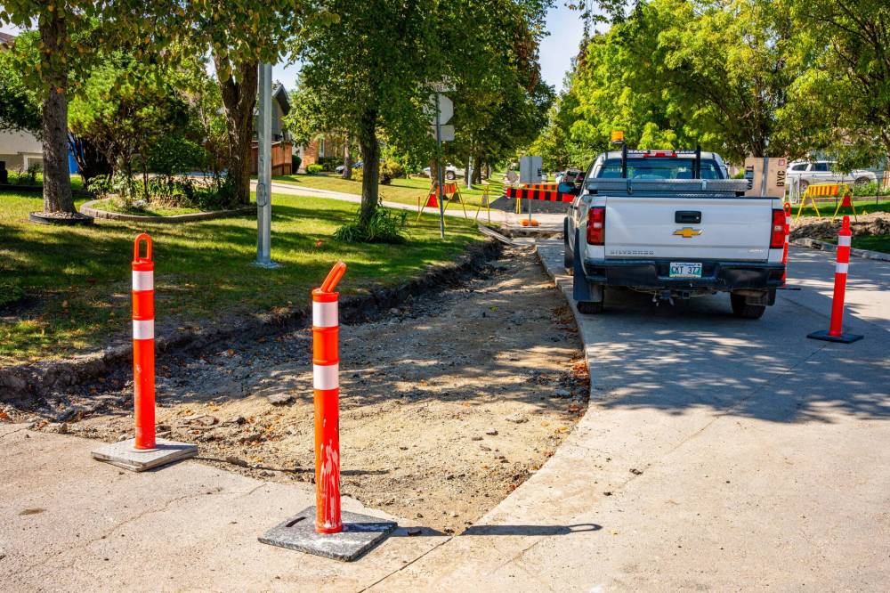 NIC ADAM / FREE PRESS
                                The entire contract, which included 11 pavement rehabilitations and five milling projects, was expected to be completed within 75 days, a deadline that was met by Bayview 
Construction.