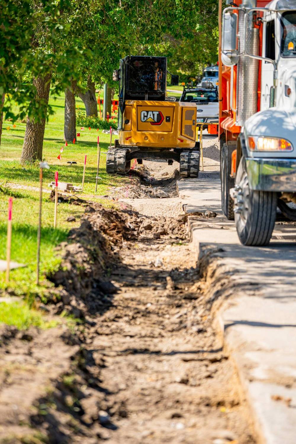 NIC ADAM / FREE PRESS
                                The project also called for new gutters and wider curbs.