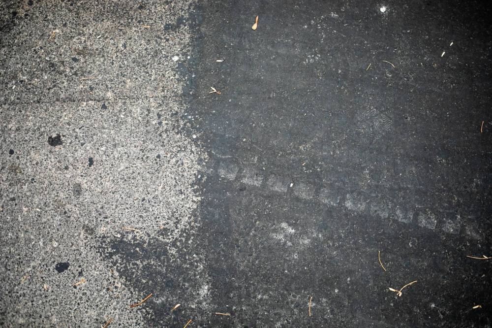 MIKAELA MACKENZIE / FREE PRESS
                                Freshly paved Augusta Drive near Chancellor Drive at the north end on Oct. 1.