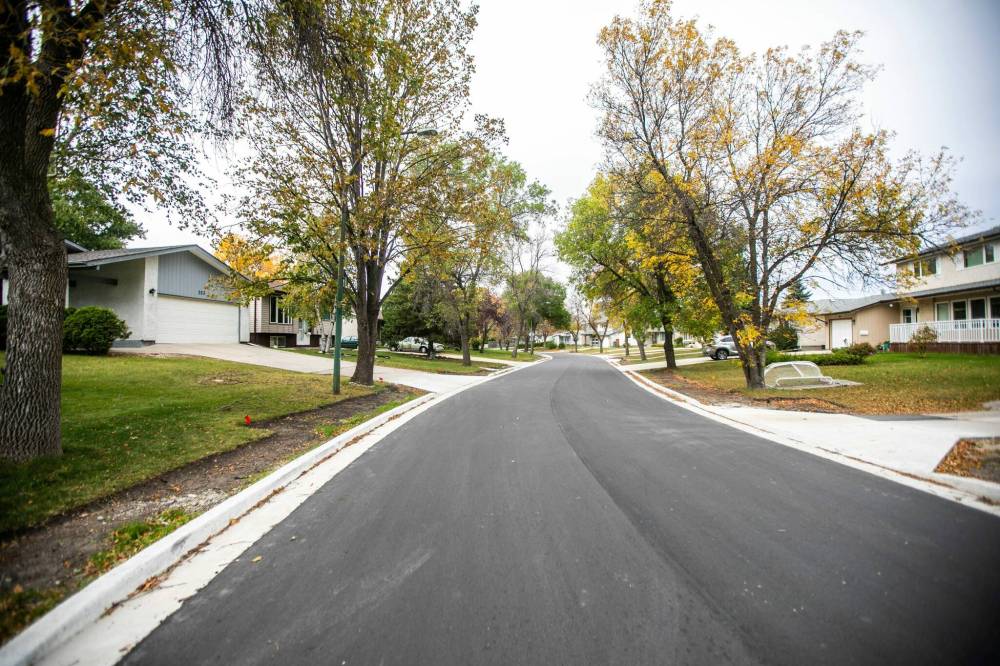 MIKAELA MACKENZIE / FREE PRESS
                                Freshly paved Augusta Drive between Chancellor and Lakeside drives in October.