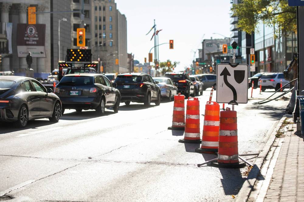 MIKAELA MACKENZIE / FREE PRESS 
                                The city aims to open the intersection to pedestrians by the time Winnipeg Transit begins to overhaul its network, which is expected to begin on June 29.