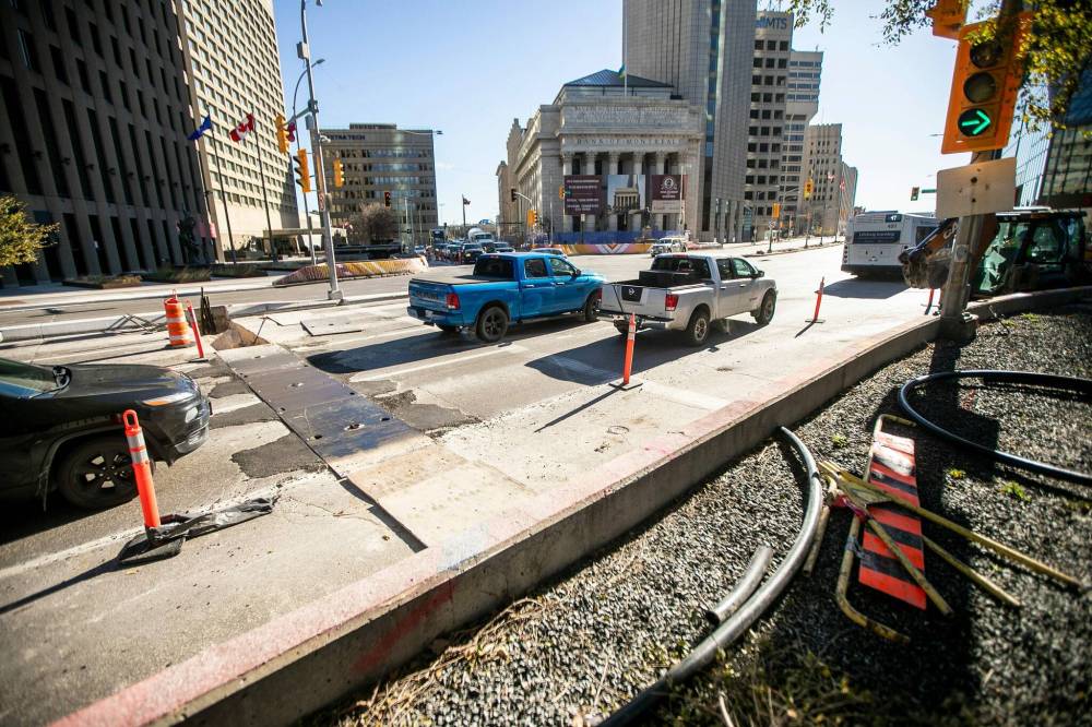 MIKAELA MACKENZIE / FREE PRESS
                                Lane closures and construction at Portage and Main in October.