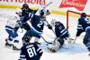 Fred Greenslade / THE CANADIAN PRESS
                                Tampa Bay’s Conor Geekie (centre) interferes with Jets’ goaltender Connor Hellebuyck on Sunday leading to the Lightning’s first goal.