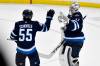 Fred Greenslade / THE CANADIAN PRESS
                                Winnipeg Jets’ goaltender Connor Hellebuyck celebrates his shutout against the Utah Hockey Club with Mark Scheifele at the end of the third period.