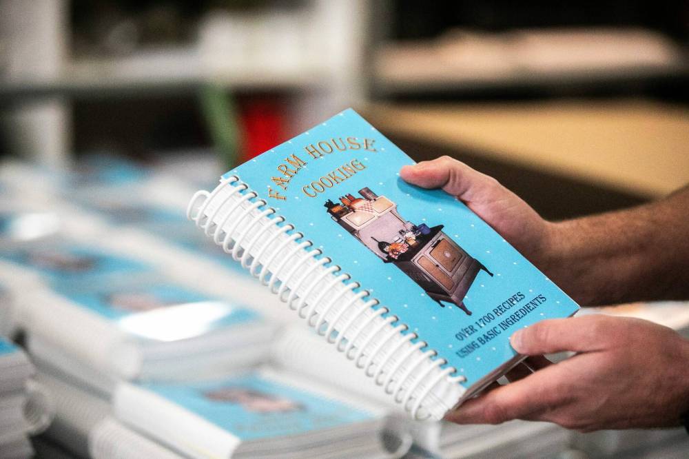 MIKAELA MACKENZIE / FREE PRESS
The company was founded as a publisher specializing in cookbook fundraising projects for community clubs and churches, but has since expanded.