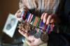RUTH BONNEVILLE / FREE PRESS
                                Gus Wasiuta was proud to wear his medals and go through photo albums from his service years.