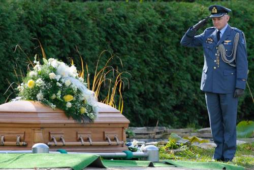 Graham Hughes / THE CANADIAN PRESS files
                                Lt. Colonel Henri J.L. Schevers, representing the Embassy of the Kingdom of the Netherlands salutes the coffin of Canadian war hero Sgt. Leo Major during his funeral in Montreal in 2008.