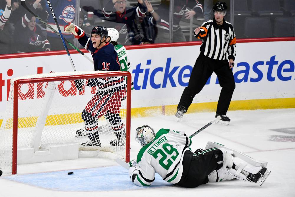 FRED GREENSLADE / THE CANADIAN PRESS
Winnipeg Jets’ Rasmus Kupari (15) celebrates after scoring on Dallas Stars goaltender Jake Oettinger (29) during first period NHL hockey action in Winnipeg, Saturday.