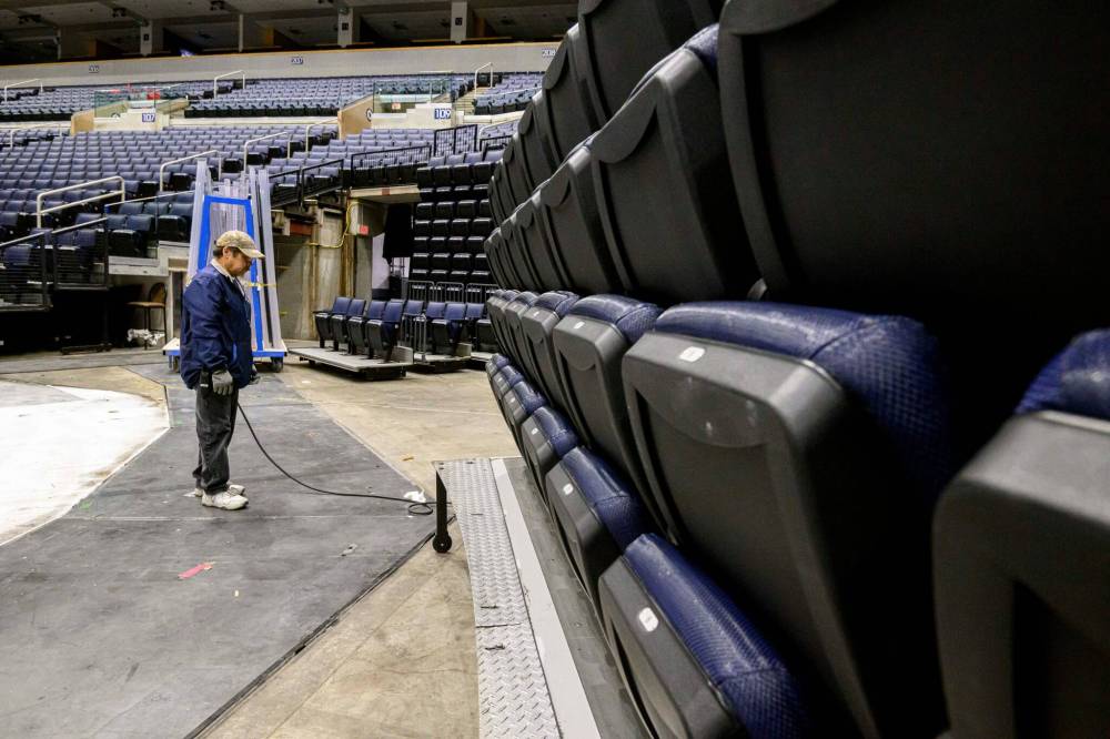 MIKE SUDOMA / FREE PRESS 
                                Lloyd Cook pushes the seats back using a remote control.