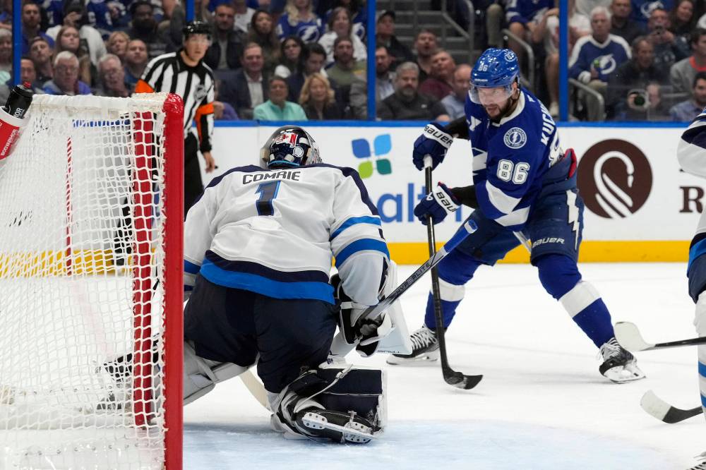 Chris O'Meara / The Associated Press
Tampa Bay Lightning right wing Nikita Kucherov shoots on Winnipeg Jets goaltender Eric Comrie during the second period.
