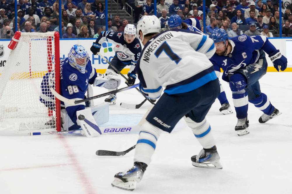 Chris O'Meara / The Associated Press
Tampa Bay Lightning goaltender Andrei Vasilevskiy stops a shot by Winnipeg Jets centreman Vladislav Namestnikov during the third period.