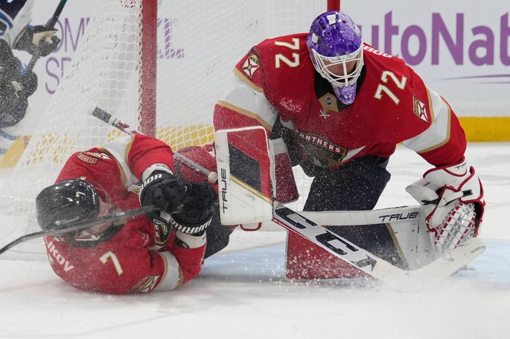 Lynne Sladky / The Associated Press
Florida Panthers defenceman Dmitry Kulikov and goaltender Sergei Bobrovsky defend the goal during the first period.