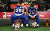 Winnipeg Blue Bombers’ Bailey Feltmate (36) and teammate Brady Oliveira (20) sit on the bench after losing the 111th Grey Cup to the Toronto Argonauts, in Vancouver, B.C., Sunday, Nov. 17, 2024. (Ethan Cairns / The Canadian Press)