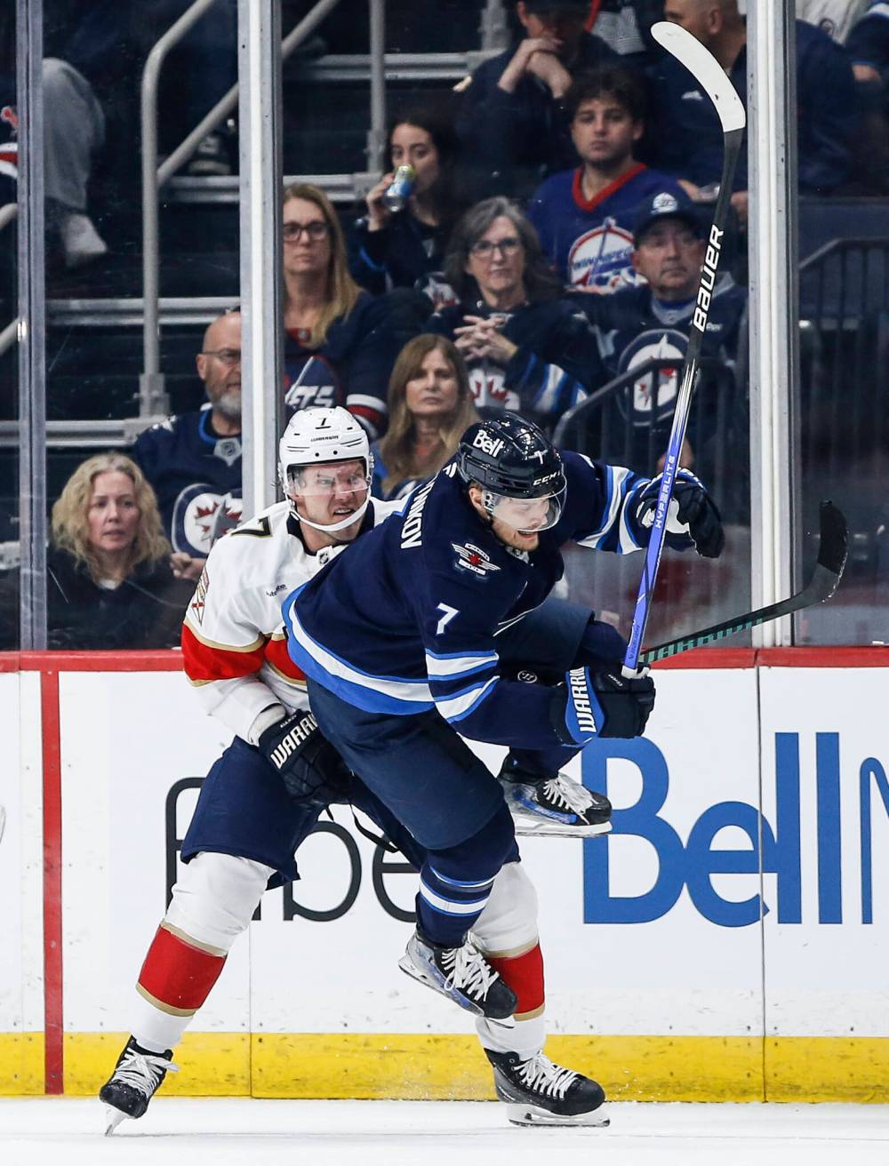 THE CANADIAN PRESS/Fred Greenslade
Florida Panthers' Dmitry Kulikov trips Winnipeg Jets' Vladislav Namestnikov in the second period.