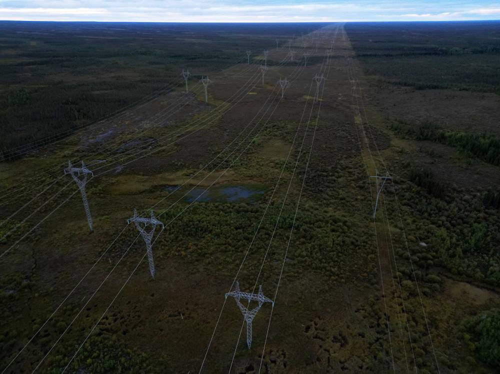 Hydro lines cut a swath through the forest that’s equivalent to 50 highway lanes. (Tim Smith / The Narwhal)