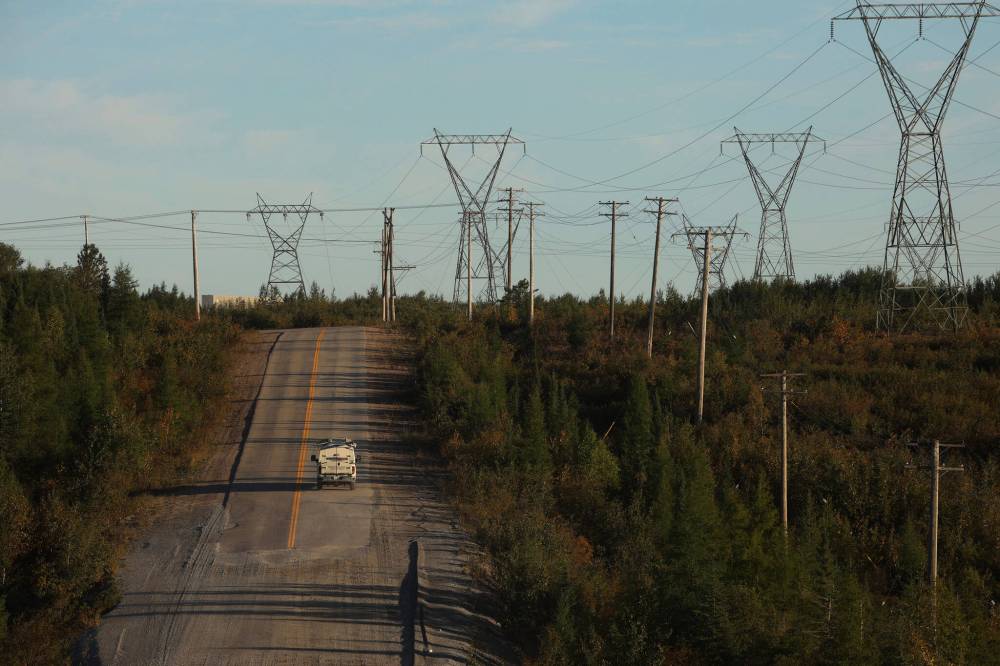 The contrast between power lines and the remote landscape is stark in northern Manitoba. (Tim Smith / The Narwhal)