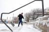Brandon Sun Photo
                                Nathaniel Delbridge shovels snow from the steps of the Western Manitoba Centennial Auditorium in Brandon on Wednesday. Though Winnipeg has dodged the snow bullet so far this week, meteorologist Natalie Hasell says the white stuff is expected to hit the Red River valley starting on Saturday with the bulk of it falling on Sunday.