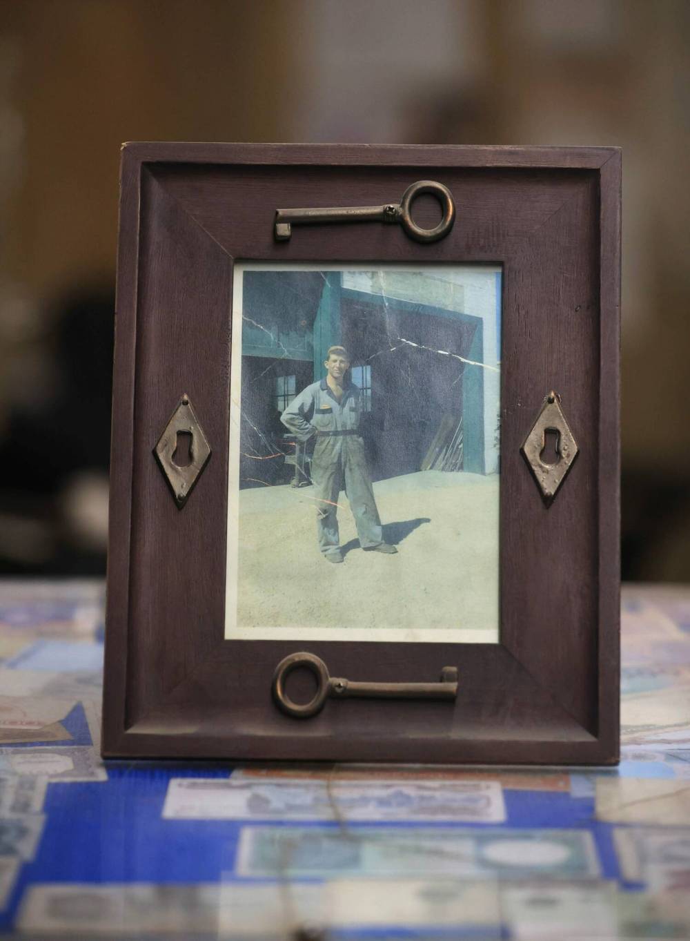 RUTH BONNEVILLE / FREE PRESS
Ron Mitchell stands in front of the shop in this family photo. Mitchell passed down the business to his son-in-law, current owner Ed Nichols.