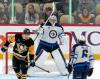 GENE J. PUSKAR / THE ASSOCIATED PRESS FILES
                                Winnipeg goaltender Connor Hellebuyck begins to celebrate a win as time runs out in an NHL game against the Pittsburgh Penguins on Friday.