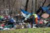 MIKAELA MACKENZIE / FREE PRESs fileS
                                Police and city workers at an encampment at Mostyn Place Park