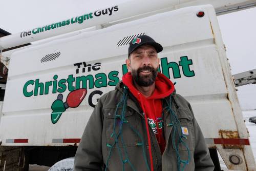MIKE DEAL / FREE PRESS
Charles Wiebe, owner of the Christmas Light Guys, a holiday lights installation company that has been around for some 25 years.