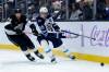 Ryan Sun / The Associated Press
                                If Jets’ top centre Mark Scheifele (right) is playing through an injury, he’s keeping it a secret.
