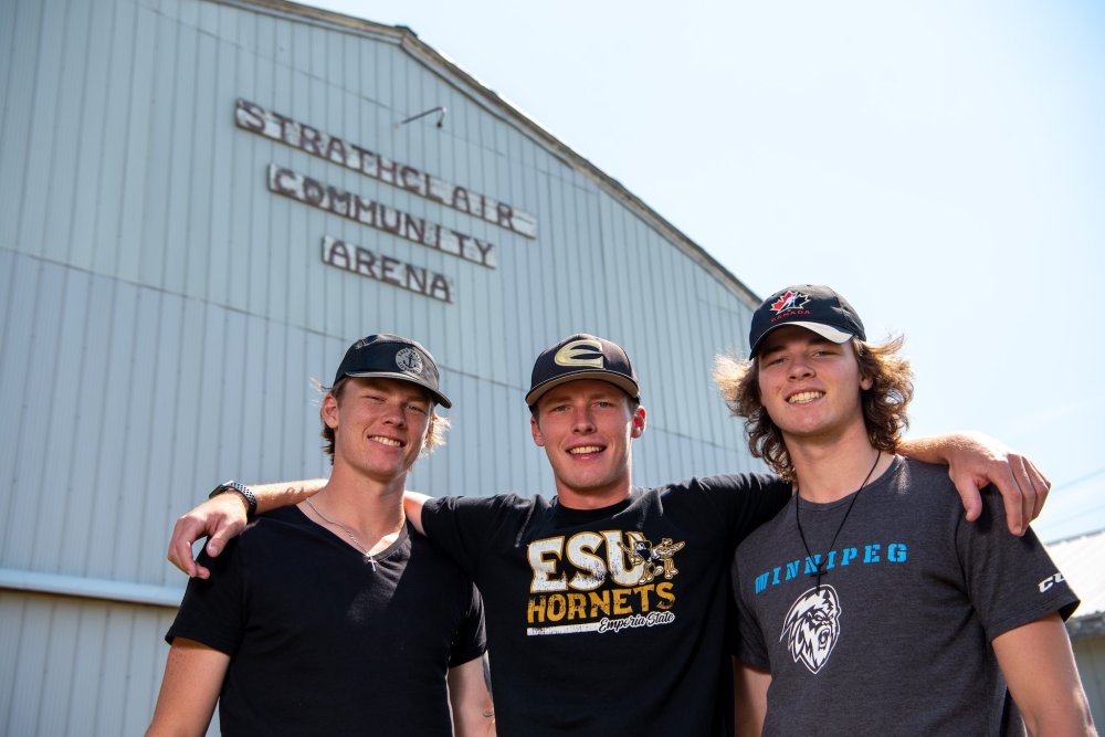 ALEX LUPUL / FREE PRESS FILES
From left, brothers Morgan, Noah and Conor Geekie outside the Strathclair Community Arena in 2021.