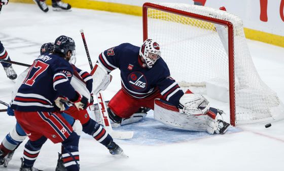 Winnipeg Jets goaltender Connor Hellebuyck stopped all 35 shots he faced on Thursday night against the Colorado Avalanche for his second straight shutout. (John Woods / The Canadian Press)