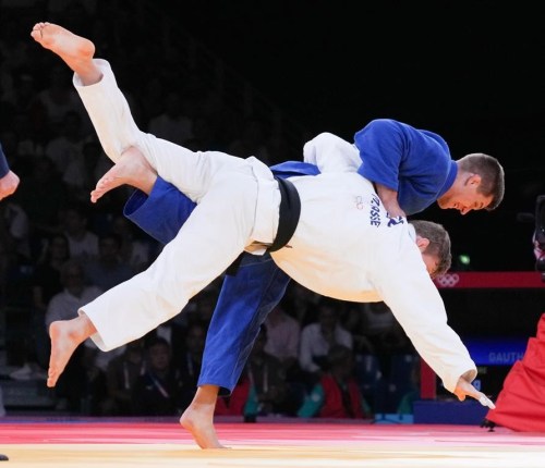 Canada's Francois Gauthier Drapeau, top, competes against Matthias Casse of Belgium in the repechage men's -81 kg judo match at the 2024 Summer Olympics in Paris, France on Tuesday, July 30, 2024. THE CANADIAN PRESS/Christinne Muschi