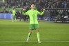 Wolfsburg's Jonas Wind celebrates after scoring during the German Bundesliga soccer match between VfL Wolfsburg and FSV Mainz 05 at the Volkswagen Arena, in Wolfsburg, Germany, Sunday, Dec. 8, 2024. (Swen Pförtner/dpa via AP)